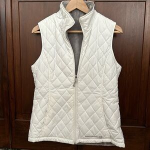 Reversible white quilted/grey fleece vest. Ladies Medium